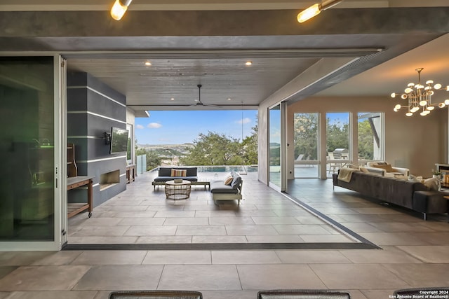 view of patio / terrace featuring ceiling fan and an outdoor hangout area