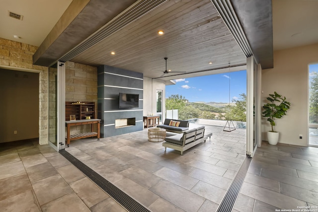 view of patio with ceiling fan