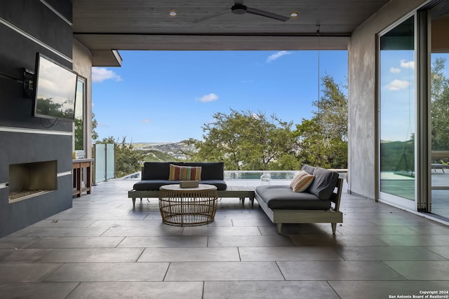 view of patio featuring ceiling fan and an outdoor hangout area