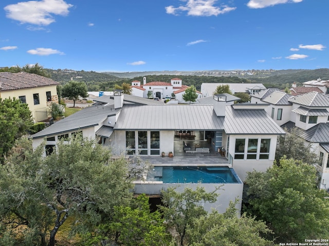 rear view of property with a patio