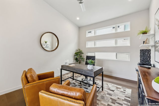 office area featuring ceiling fan, high vaulted ceiling, and dark hardwood / wood-style flooring