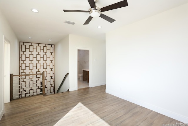 19402 Easy Oak, San Antonio, TX 78258 - spare room featuring recessed lighting, baseboards, visible vents, and wood finished floors