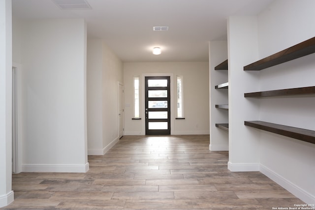 foyer entrance featuring light hardwood / wood-style flooring