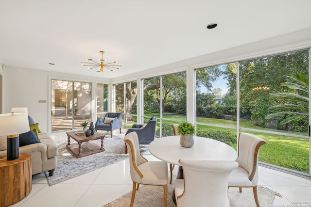 sunroom with a notable chandelier