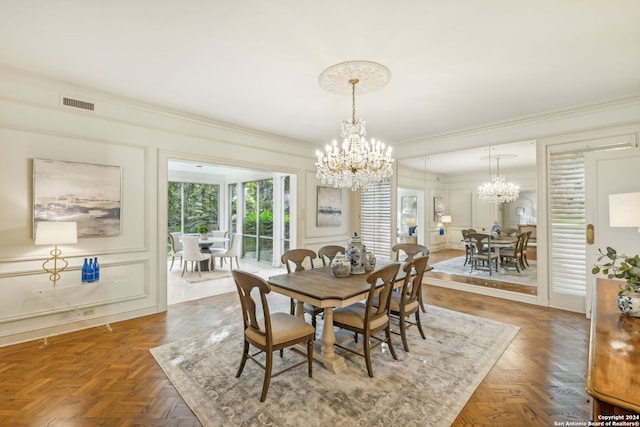 dining room featuring dark parquet flooring and crown molding