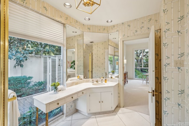 bathroom featuring walk in shower, tile patterned flooring, and vanity