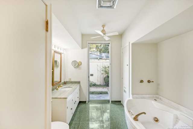 800 Ivy Ln, Terrell Hills, TX 78209 - full bath featuring vanity, a tub with jets, ceiling fan, and tile patterned floors