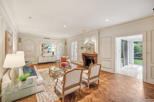 living room featuring light parquet flooring and crown molding