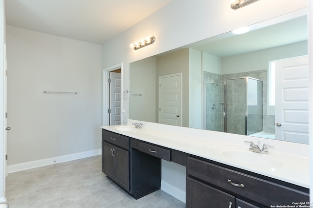 bathroom with vanity, tile patterned floors, and an enclosed shower