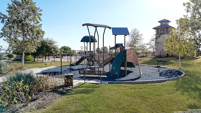 view of jungle gym with a yard