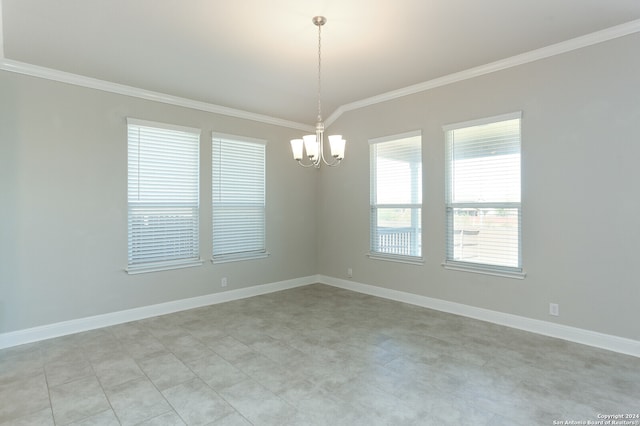 unfurnished room with a chandelier and ornamental molding