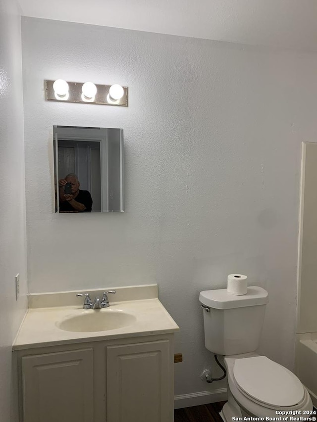 9058 Boston Hbr, San Antonio, TX 78242 - bathroom with vanity, toilet, and a bathtub