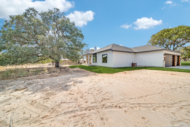 view of property exterior featuring a garage