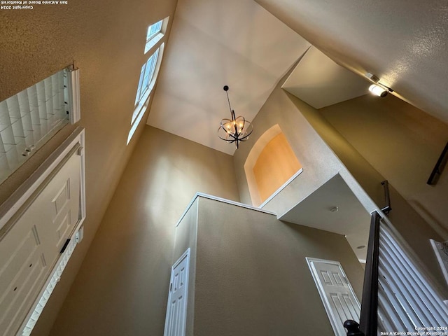 interior details featuring a notable chandelier