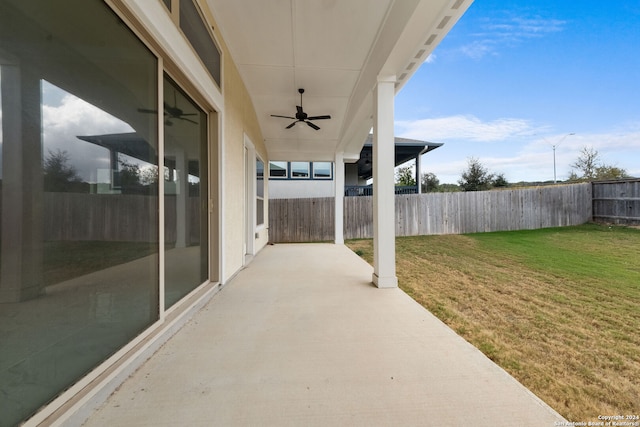 view of patio featuring ceiling fan