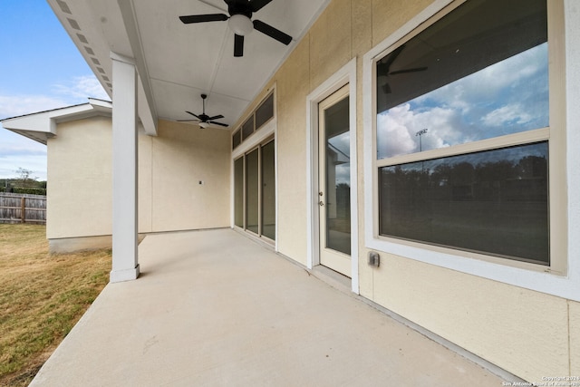 view of patio featuring ceiling fan