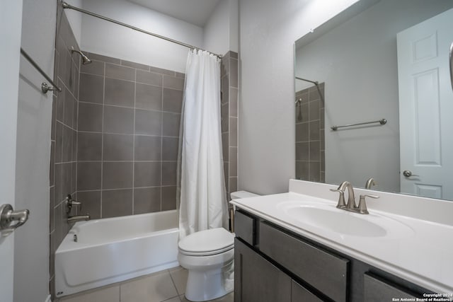 full bathroom with vanity, toilet, tile patterned floors, and shower / bath combo