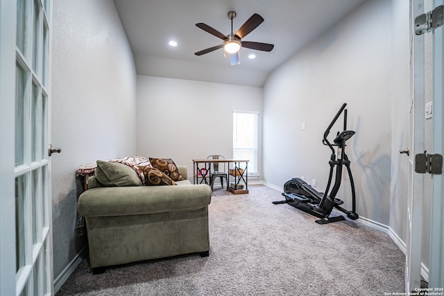 workout room with lofted ceiling, carpet flooring, and ceiling fan