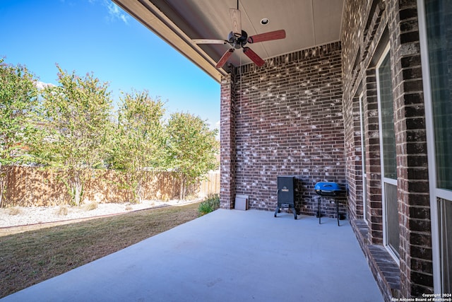 view of patio featuring ceiling fan and grilling area