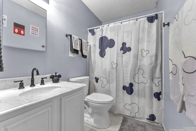 bathroom featuring vanity, a shower with curtain, a textured ceiling, and toilet