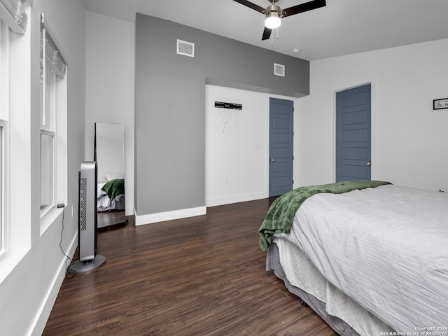 bedroom featuring dark hardwood / wood-style flooring and ceiling fan