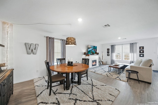 dining area with wood-type flooring