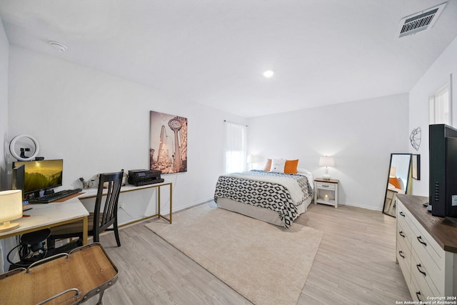 bedroom featuring light wood-type flooring