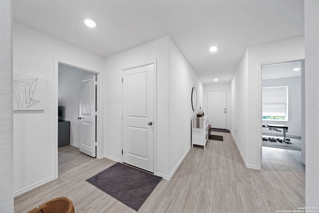 hall featuring light wood-type flooring