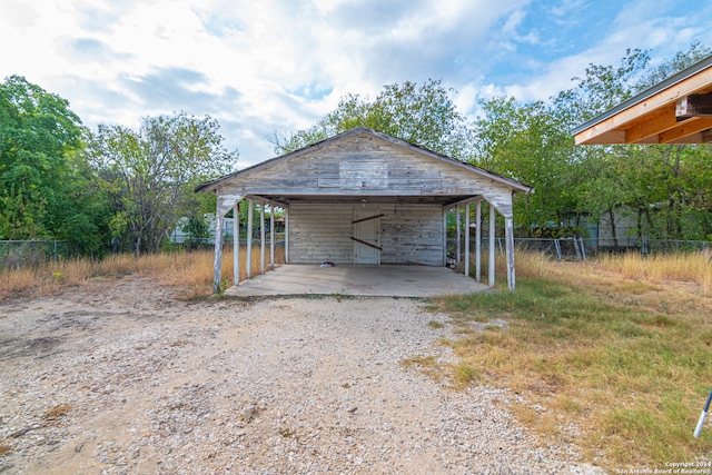 exterior space featuring a carport