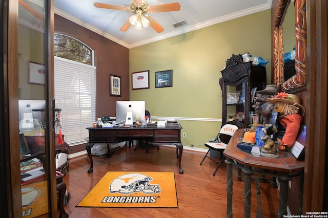 home office featuring ceiling fan, hardwood / wood-style floors, and ornamental molding