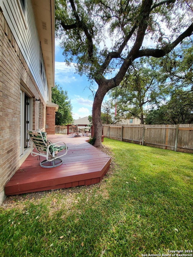 view of yard with a deck