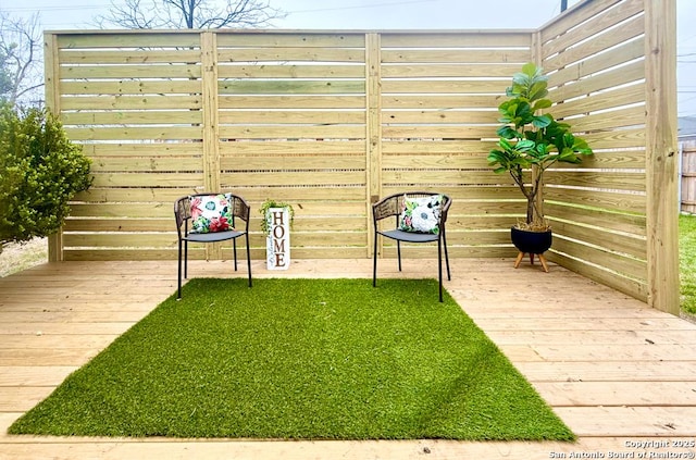 view of yard featuring a wooden deck