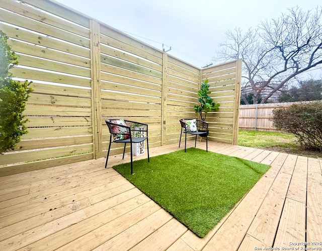 exterior space featuring a wooden deck