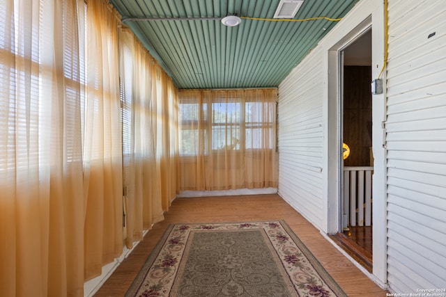 view of unfurnished sunroom