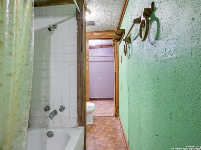 bathroom with parquet flooring, toilet, a textured ceiling, and shower / bathtub combination with curtain