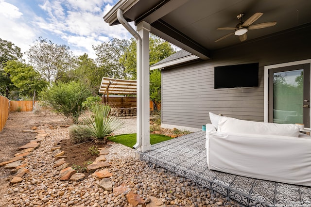 view of patio / terrace featuring ceiling fan and an outdoor hangout area