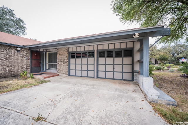 exterior space featuring a garage