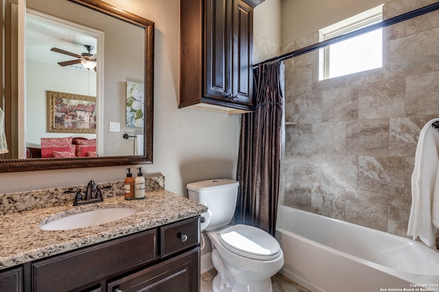 full bathroom featuring vanity, toilet, shower / bathtub combination with curtain, and ceiling fan