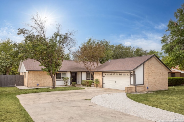 ranch-style house with a front lawn and a garage