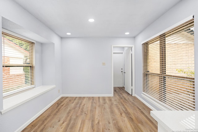 empty room with light wood-type flooring