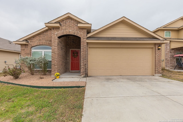 view of front of property featuring a garage