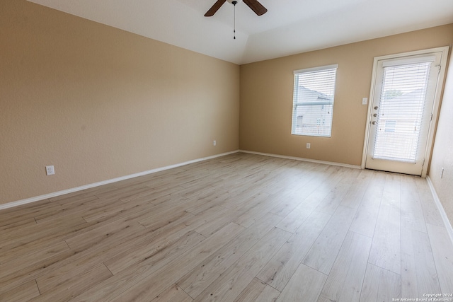 empty room featuring ceiling fan and light hardwood / wood-style floors