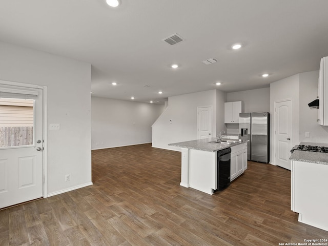 kitchen featuring black dishwasher, stainless steel refrigerator with ice dispenser, an island with sink, and dark wood-type flooring