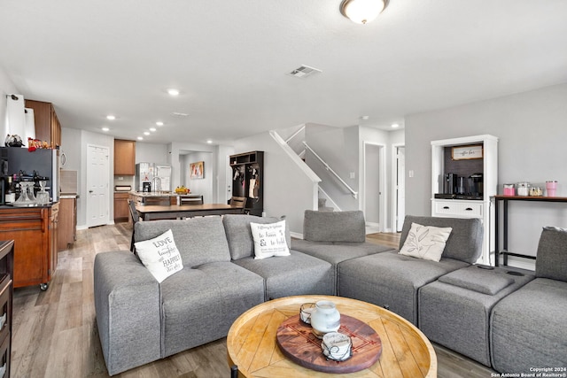 living room featuring light hardwood / wood-style floors