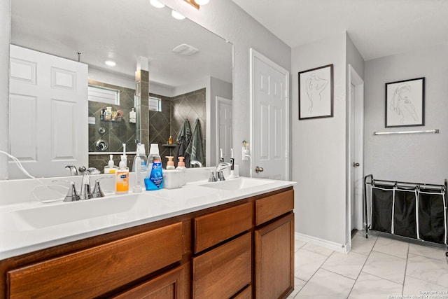 bathroom with vanity and an enclosed shower