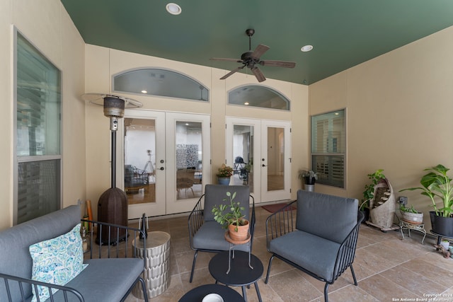 view of patio with ceiling fan and french doors