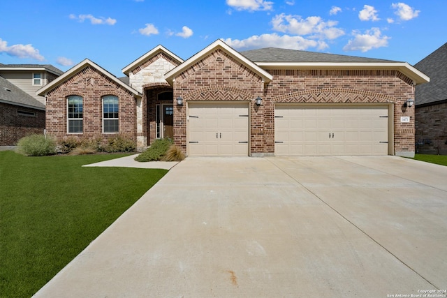 14471 Costa Leon, San Antonio, TX 78245 - french country style house featuring brick siding, driveway, a garage, and a front yard