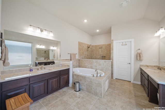 14471 Costa Leon, San Antonio, TX 78245 - bathroom featuring a bath, walk in shower, tile patterned floors, two vanities, and vaulted ceiling