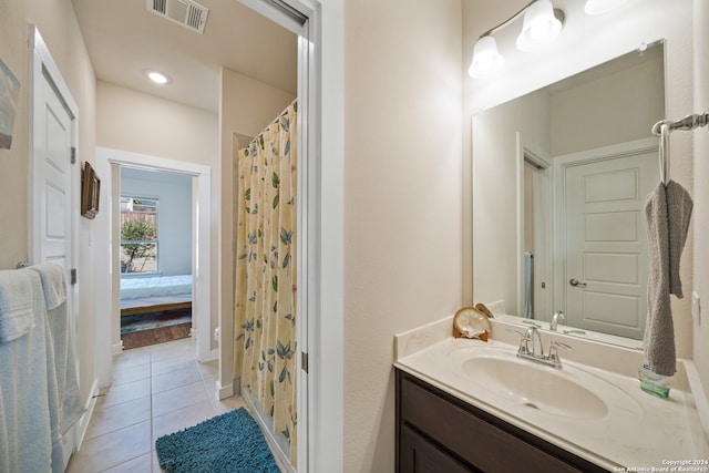 bathroom featuring vanity and tile patterned floors