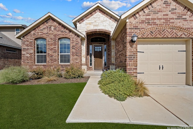 14471 Costa Leon, San Antonio, TX 78245 - french country inspired facade featuring an attached garage, brick siding, a front yard, and concrete driveway